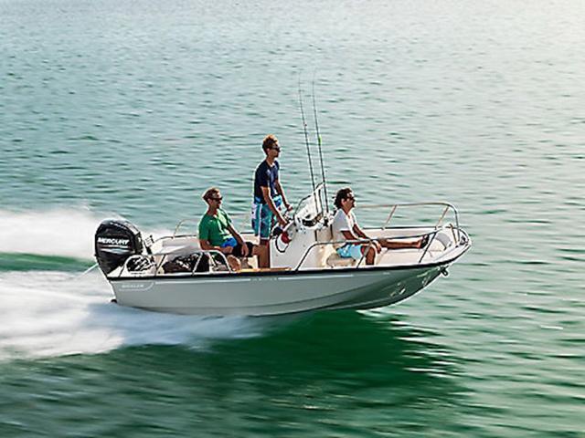 Boston Whaler 150 Montauk 2025 Boston Whaler 150 Montauk boat cruising on open water with three passengers.