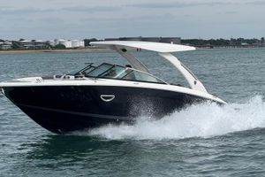 Regal LS9 2025 Regal LS9 boat cruising on open water, showcasing sleek design and performance.