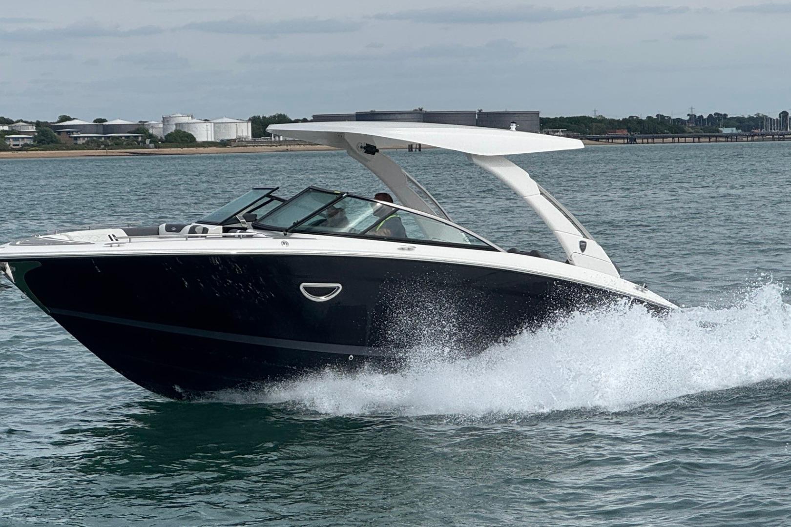 Regal LS9 2025 Regal LS9 boat cruising on open water, showcasing sleek design and performance.