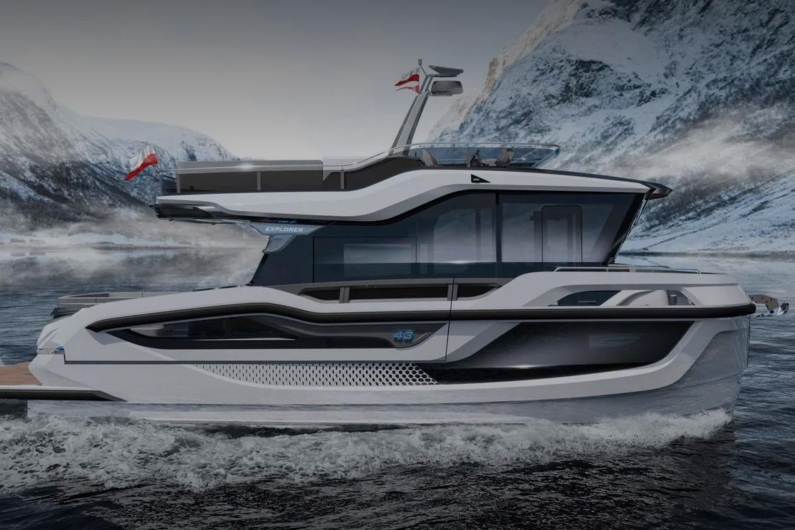 Galeon 430 EXP 2026 Galeon 430 EXP yacht cruising in icy waters with snowy mountain backdrop.