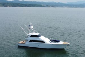 Oceanfast 87 Enclosed Bridge Luxurious 1996 Oceanfast 87 Enclosed Bridge yacht on calm waters.
