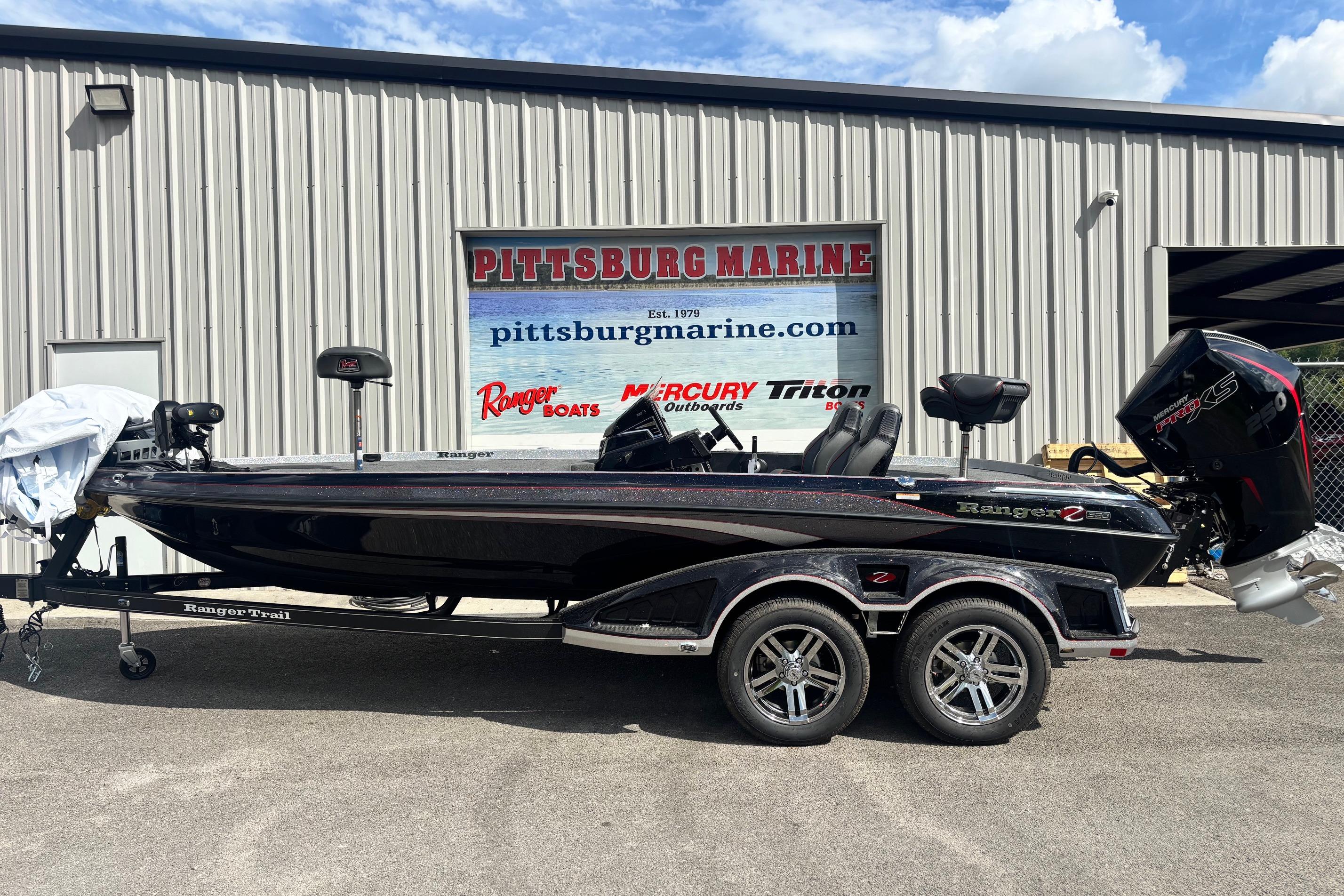 Ranger Z520R 2025 Ranger Z520R boat at Pittsburg Marine dealership, featuring sleek design and powerful engine.