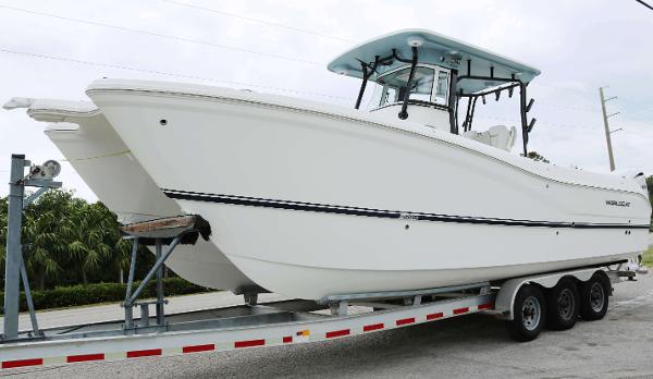 World Cat 295 CC 2025 World Cat 295CC boat on trailer, white hull, center console design.