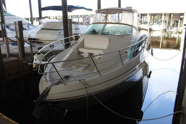 Carver 360 Mariner 2004 Carver 360 Mariner docked in a marina, surrounded by other boats.