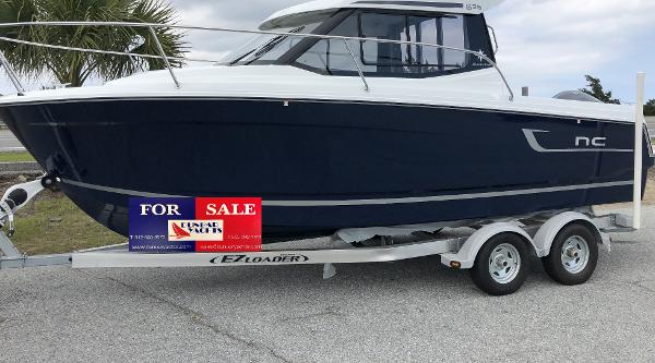 Jeanneau NC 695 2023 Jeanneau NC 695 boat for sale on trailer.