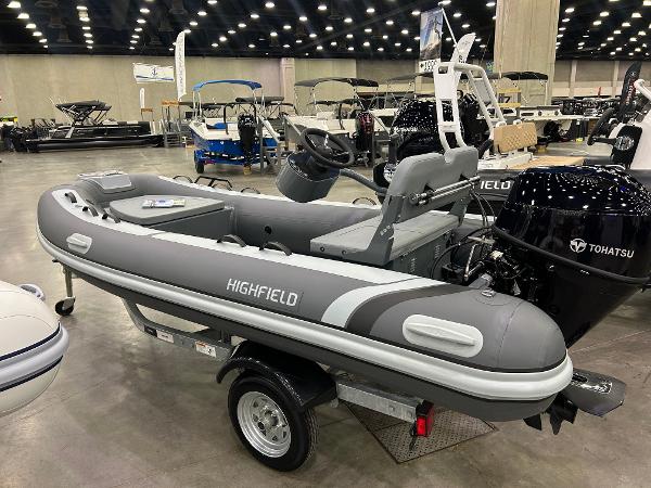 Highfield Classic 380 FCT 2024 Highfield Classic 380 FCT inflatable boat displayed indoors on a trailer.