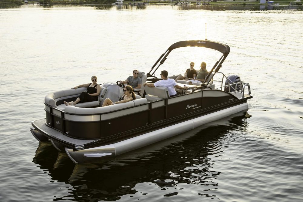The 2022 Barletta Cabrio 24UE pontoon has a high-topped table great for entertaining. 